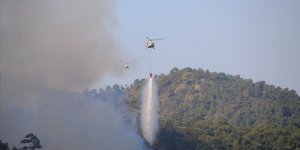 20 helikopter ve 14 uçakla Marmaris'teki yangına müdahale ediliyor